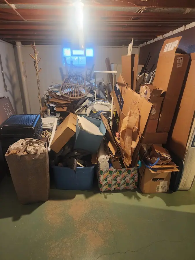 Roll-off dumpster container at job site for 2 Yard Dumpster Rental in Waterloo